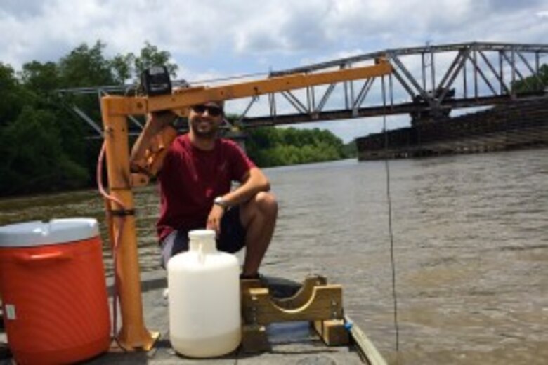 A Phinizy Center scientist collecting an integrated water sample on the Savannah River.