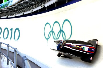 Bobsled pilot Steven Holcomb, a former member of the Utah National Guard, posts the sixth-fastest time of 51.89 seconds with Curt Tomasevicz aboard USA 1 in the first heat of the Olympic two-man bobsled competition Feb. 20, 2010, in Whistler, British Columbia.