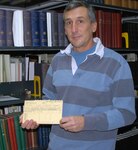 New York State Military Museum librarian James Gandy holds one of more than 10,000 Regimental Personnel Cards containing information on New York National Guard Soldiers who enlisted or reenlisted in the 369th Infantry, later the 369th Coast Artillery, between 1921 and 1949. The cards are being scanned and the information digitized on data bases and posted on the New York Heritage Digital Collection and will also be posted on the New York State Military Museum website. 
