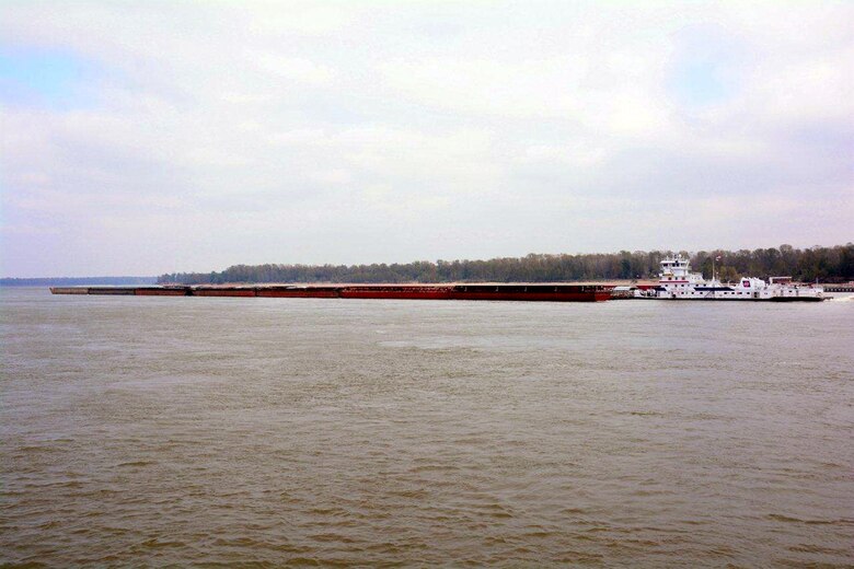At noon Nov. 12 the motor vessel E. BRONSON INGRAM, 10,500 HP, passed the mat sinking plant northbound with 49 barges. (Photo by Eugene Wall)

