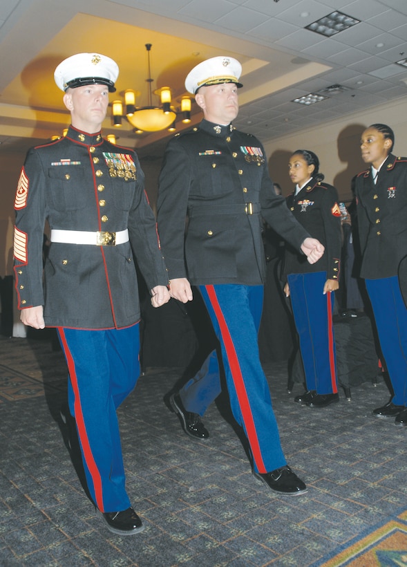Maj. Gregory M. Long, (right) officer-in-charge, Detachment 2, Supply Company, Combat Logistics Battalion-453, escorts guest of honor Sgt. Maj. James J. Karnes Jr., regimental sergeant major, Combat Logistics Regiment-4, 4th Marine Logistics Group, during the detachment’s 239th Marine Corps Birthday Ball celebration at the Hilton Garden Inn in Albany, Ga., Nov. 1.