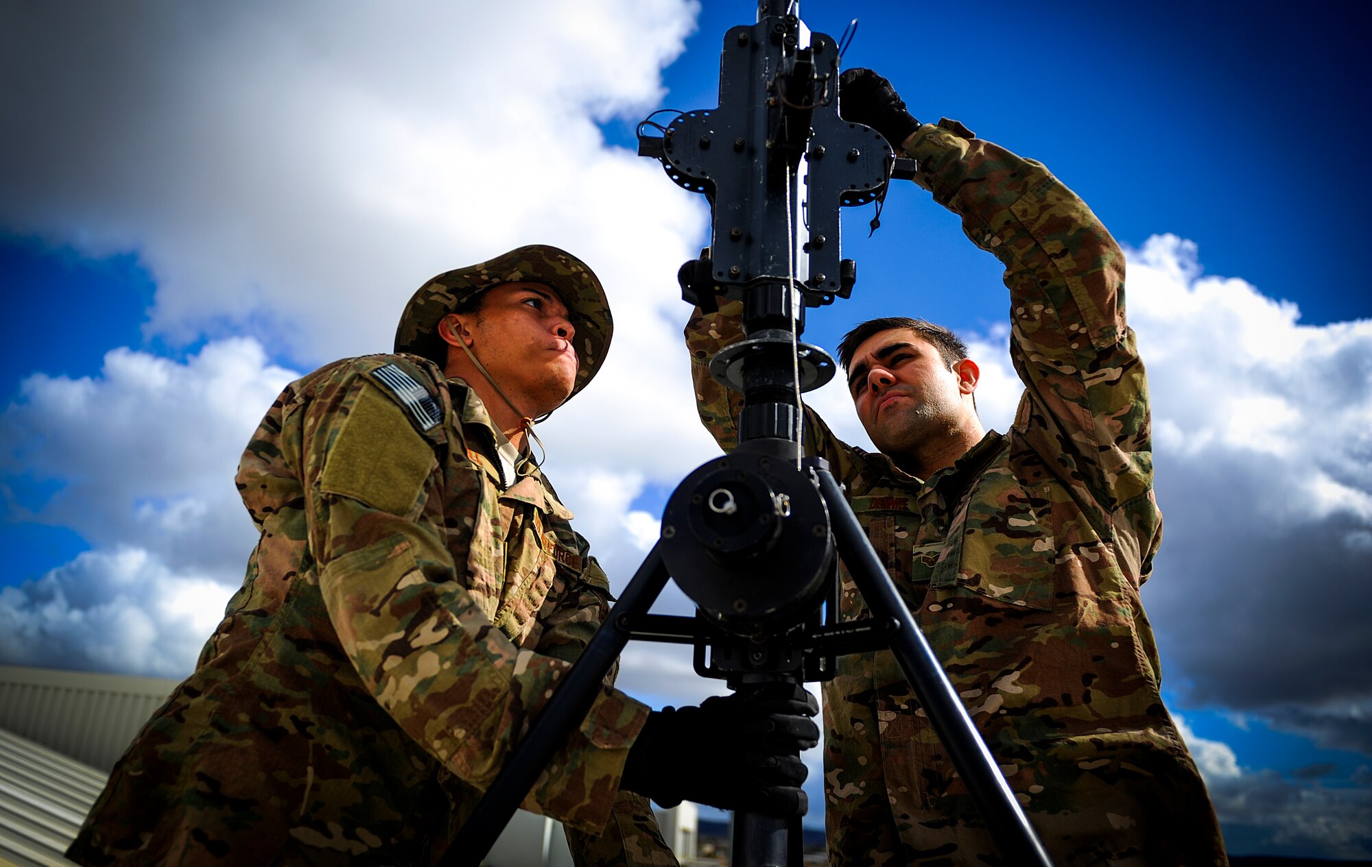 Airmen from the 1st Special Operations Communications Squadron, construct an antenna in support of Exercise Carbonite Archer on Marine Corps Air Station Miramar at San Diego, Calif., Nov. 1, 2014. Carbonite Archer is an emergency deployment readiness exercise focusing on the 1st Special Operations Wing’s ability to deploy aircraft and personnel anytime and anywhere in the world. (U.S. Air Force photo/Senior Airman Christopher Callaway