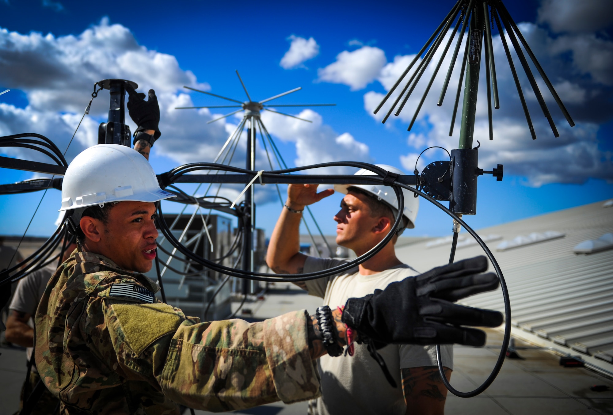Senior Airman Jevon Bell, 1st Special Operations Communications Squadron tactical communication technician, constructs an antenna in preparation for Exercise Carbonite Archer on Marine Corps Air Station Miramar at San Diego, Calif., Nov. 1, 2014. Carbonite Archer is an emergency deployment readiness exercise focusing on the 1st Special Operations Wing’s ability to deploy aircraft and personnel anytime and anywhere in the world. (U.S. Air Force photo/Senior Airman Christopher Callaway)