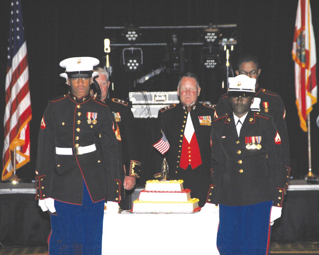Marines, Sailors, Civilian-Marines and base officials from Marine Corps Logistics Base Albany, Marine Corps Logistics Command, Marine Corps Systems Command, as well as associated tenant commands, celebrate the 239th birthday of the Marine Corps in Jacksonville, Fla., Saturday. Retired Maj. Gen. Charles M. Gurganus was the guest of honor at the birthday celebration and shared experiences, stories and significant command and mission impacts of each respective command, and those present at the ceremony, to the overall Marine Corps mission, specifically in efforts and operations in Afghanistan, during his remarks.  All present enjoyed camaraderie, fellowship, an elegant experience and atmosphere, great food and a chance to share the moment with other brothers and sisters in arms during the birthday celebration. 