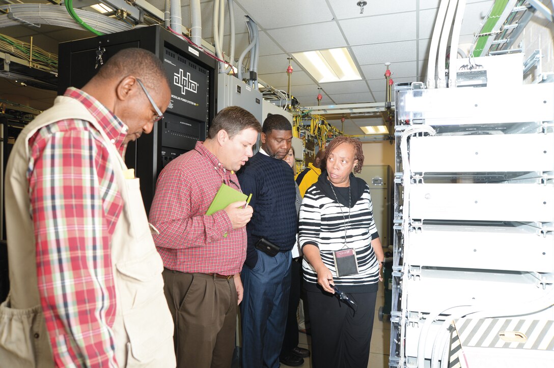 During the Voluntary Protection Program inspection, employees tour a server room at Marine Corps Logistics Base Albany Nov. 5. 