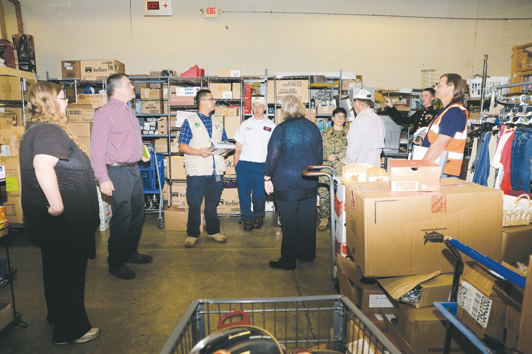 Staff Sgt. Michael Murphy (second right) explains safety procedures during the VPP inspection Nov 5.