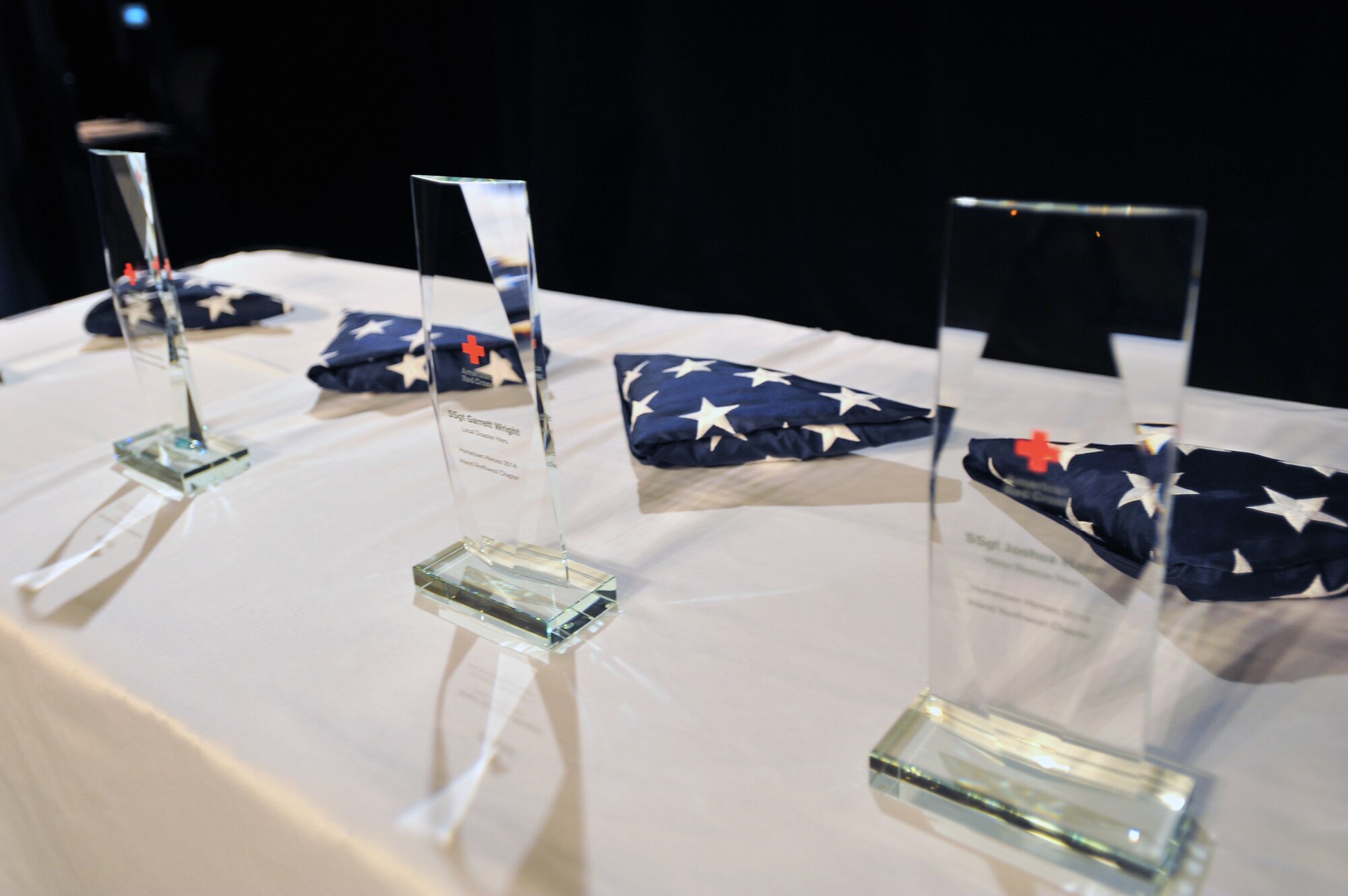 Three Team Fairchild Airmen, along with a team from the 141st Air National Guard, were recognized Nov. 12, 2014, at the 11th Annual American Red Cross Honoring Hometown Heroes Luncheon in Airway Heights, Wash. More than 600 Spokane community and service members were in attendance as these heroes were honored for their significant accomplishments and positive impacts on the lives of others. (U.S. Air Force photo/Staff Sgt. Veronica Montes)