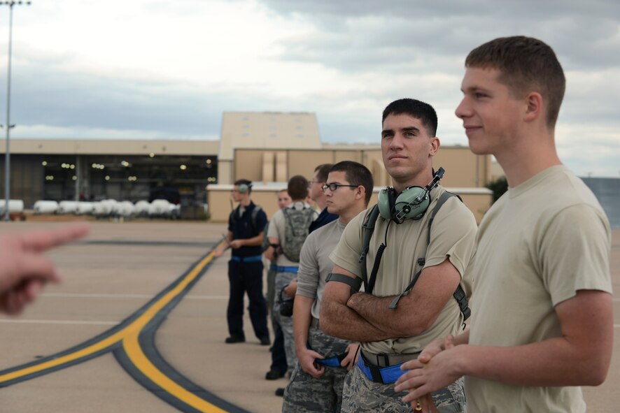 Dyess Airmen from the 7th Maintenance Group prepare to conduct a Foreign Object Debris (FOD) walk on the flight line Nov. 3, 2014, at Dyess Air Force Base, Texas. Airmen participate in walks twice a day to ensure that FOD is removed from the runway to prevent damage to aircraft and equipment. (U.S. Air Force photo by Airman 1st Class Kedesha Pennant/Released)