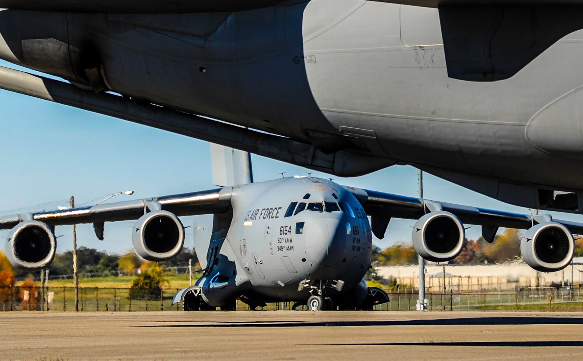 A C-17 Globemaster assigned to the 60th Air Mobility Wing at Travis Air Force Base, Calif., taxies down the tarmac Nov. 1, 2014, at Nashville International Airport, Tenn. More than 50 Airmen boarded the aircraft to return to Travis AFB after attending the 46th Annual Airlift/Tanker Association Convention. (U.S. Air Force photo/Airman 1st Class Harry Brexel/Released)