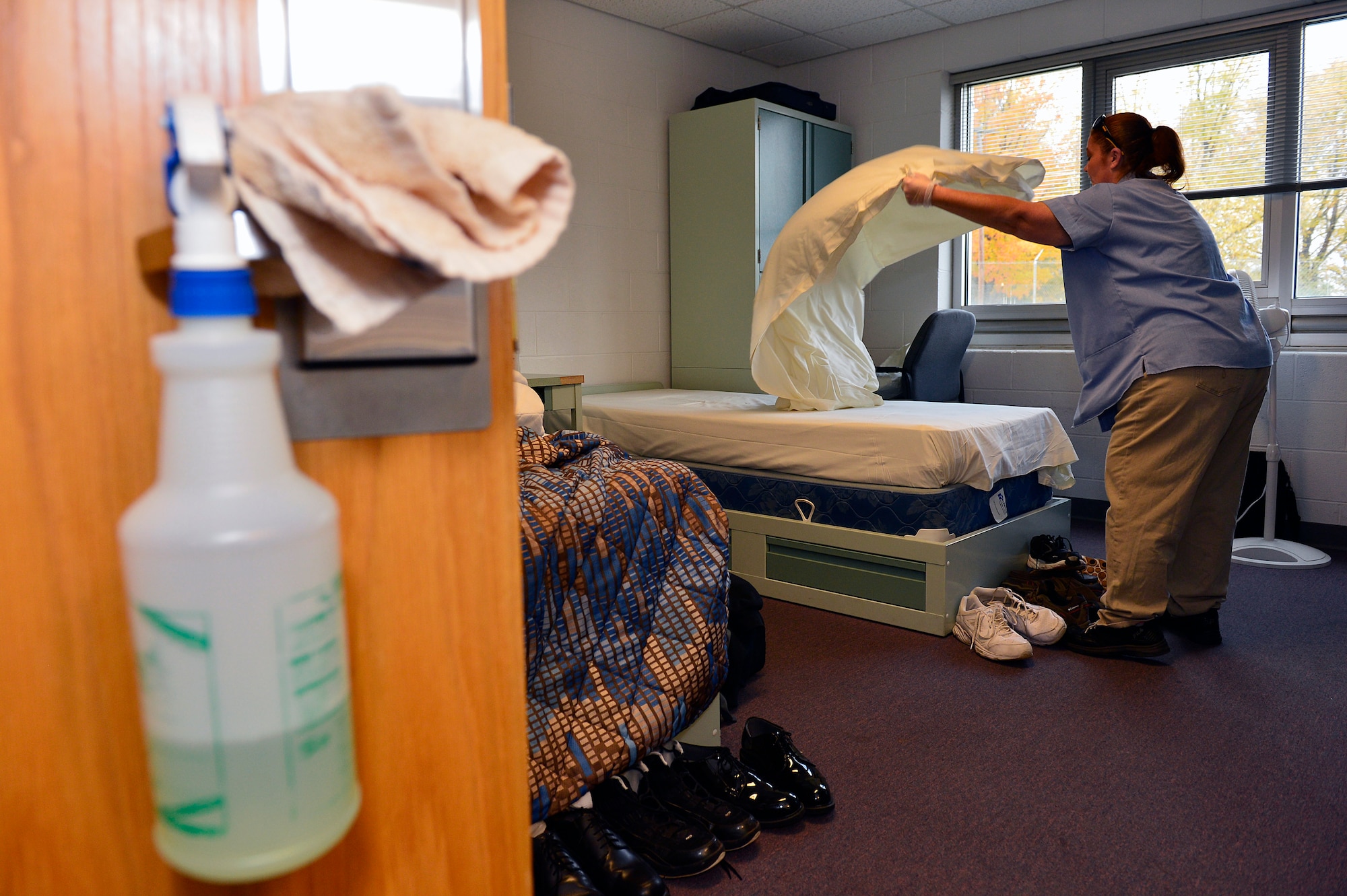 MCGHEE TYSON AIR NATIONAL GUARD BASE, Tenn. - Keeping up with a large list of daily duties, Ramona Morales and others changed bed linins and towels here Nov. 7, 2014, among other services at the McGhee Tyson Inn. (U.S. Air National Guard photo by Master Sgt. Mike R. Smith/Released)