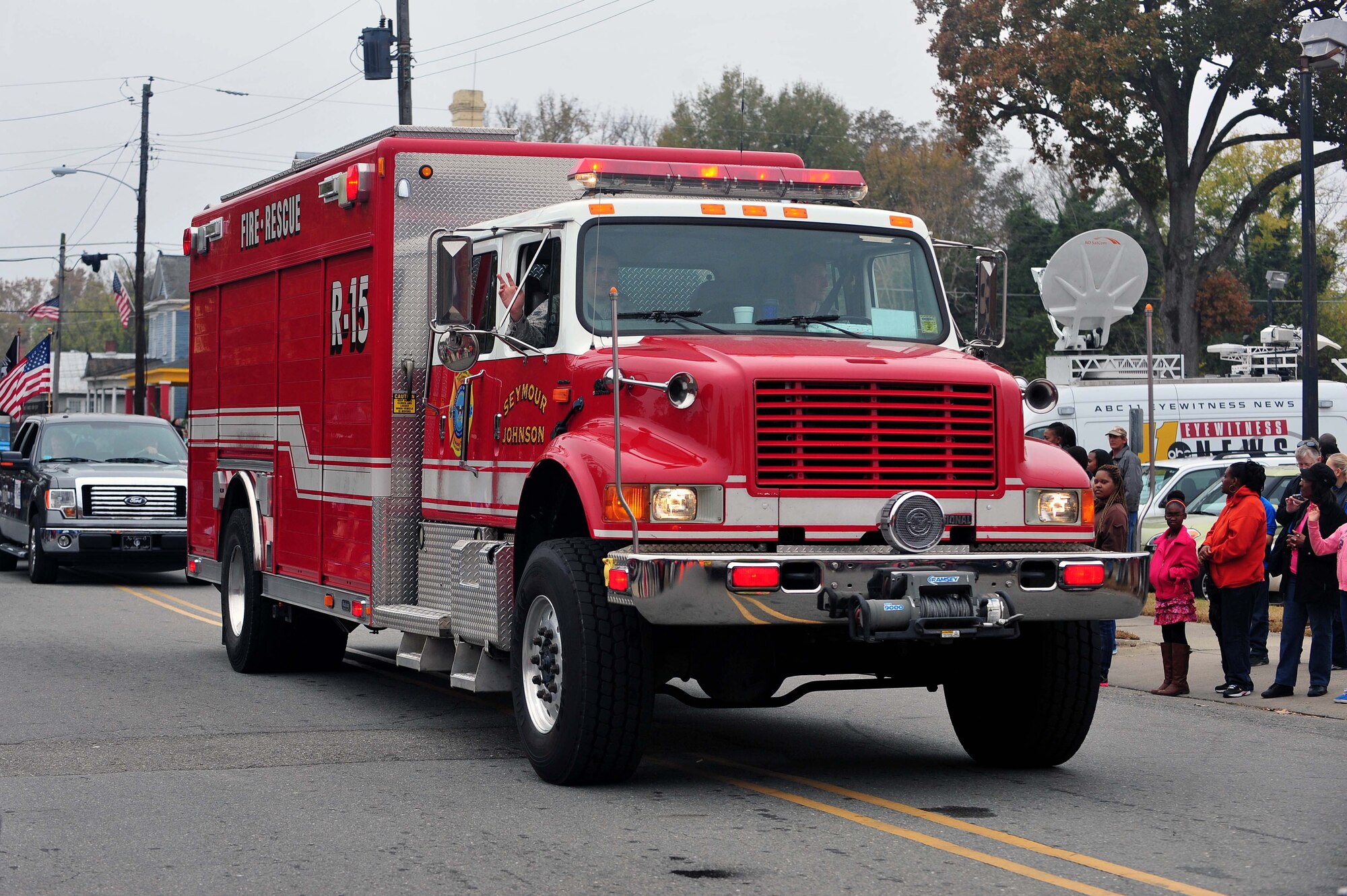 A 4th Civil Engineer Squadron fire truck rolls through the Veterans Day parade in Goldsboro, North Carolina, Nov. 11, 2014. (U.S. Air Force photo/Senior Airman John Nieves Camacho)