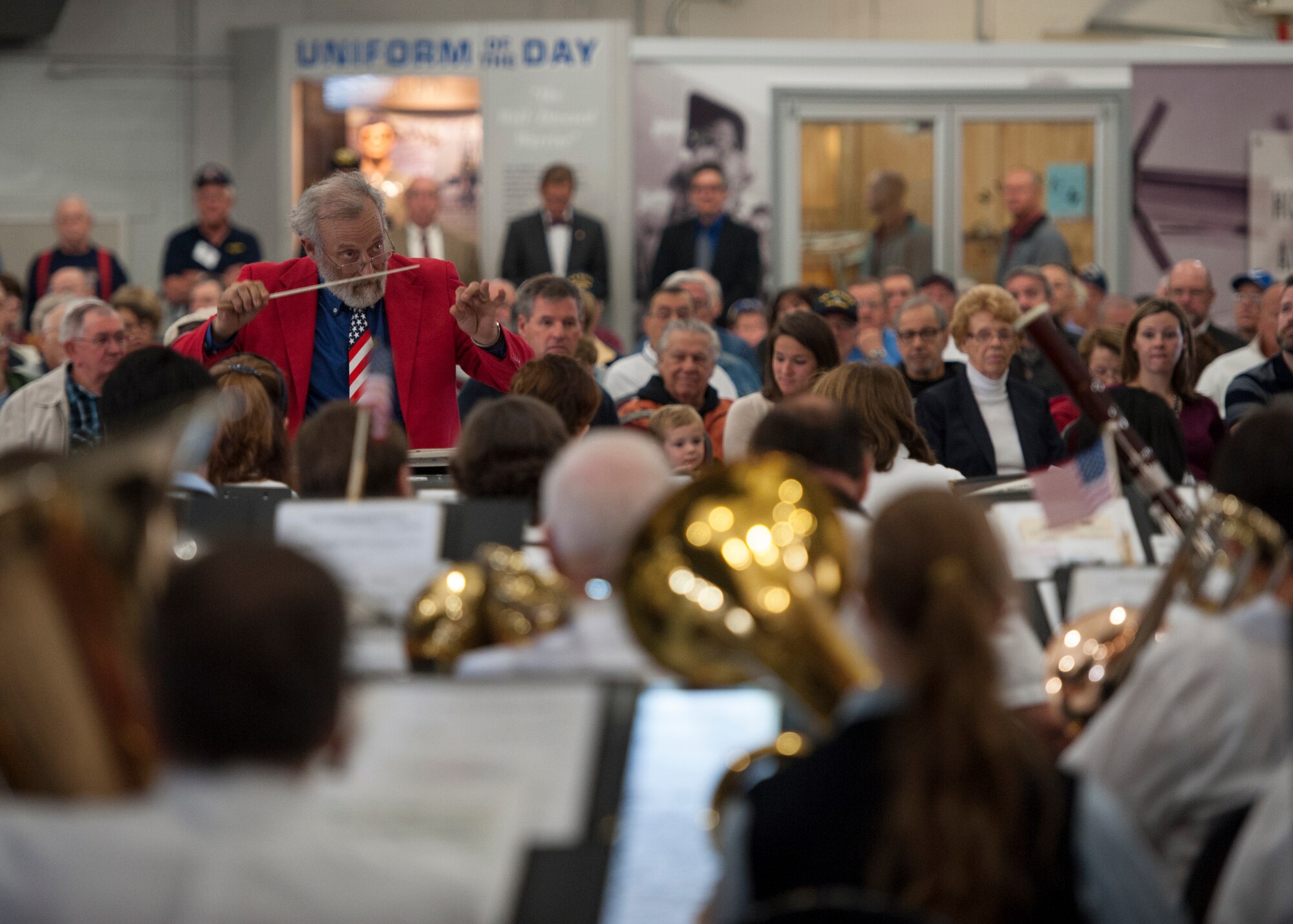 The Milford Community Band, from Milford, Del., performs at a Veterans Day Celebration Nov. 11, 2014, at the Air Mobility Command Museum, on Dover Air Force Base, Del. The band performed the “Star Spangled Banner,” and many other songs during the celebration. (U.S. Air Force photo/Airman 1st Class Zachary Cacicia)