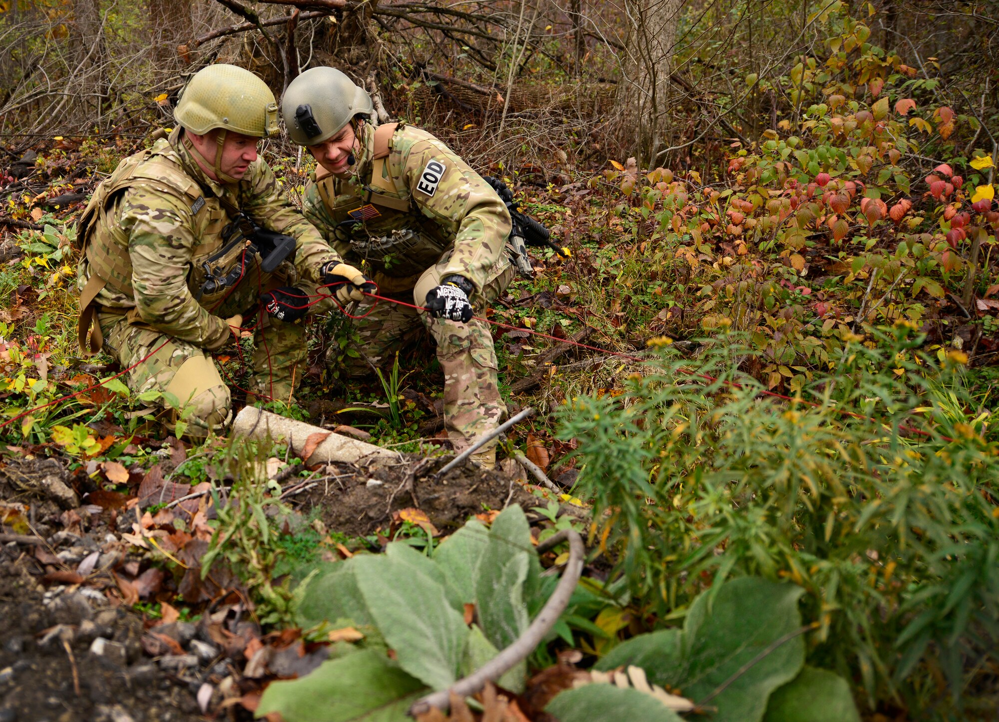 Airmen of the 914th Explosive Ordnance Disposal Squadron conduct training on mock improvised explosive devices during a joint exercise with the 914th Security Forces Squadron, at the Niagara Falls Air Reserve Station N.Y. on November 1, 2014. Members of the 914th EOD, along with personnel from the 914th Security Forces Squadron participated in the day-long exercise which combined the unique expeditionary combat skills of each squadron and allowed members the opportunity to observe the other’s practices and procedures. 