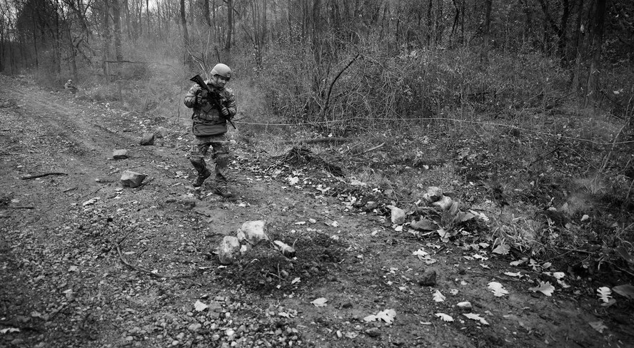 Tech. Sgt. Kyle Spalding 914th Explosive Ordnance Disposal Squadron training NCOIC patrols for mock improvised explosive devices during a joint exercise with the 914th Security Forces Squadron, at the Niagara Falls Air Reserve Station N.Y. on November 1, 2014. The training activities simulated a 914th SFS vehicle convoy moving through a deployed location. Personnel encountered various threats which required EOD to intervene to perform removal procedures. 