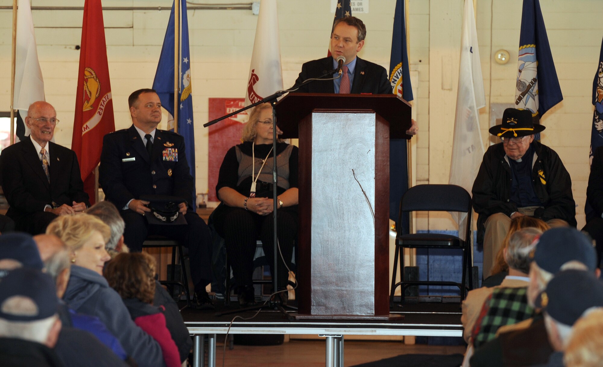 Spokane Mayor David Condon, a U.S. Army veteran, address a crowd of more than 300 people during “Welcome Home” community tribute to all veterans Nov. 11, 2014, at Felts Field in Spokane Valley, Wash. The event, hosted by the Honor Point Military and Aerospace Museum, featured a variety of speakers and entertainment provided by the Mt. Spokane High School Marching Band and the Spokane Brass Works. Veterans Day is a celebration to honor America's veterans for their patriotism, love of country, and willingness to serve and sacrifice for the common good. (U.S. Air Force photo/Staff Sgt. Samantha Krolikowski)