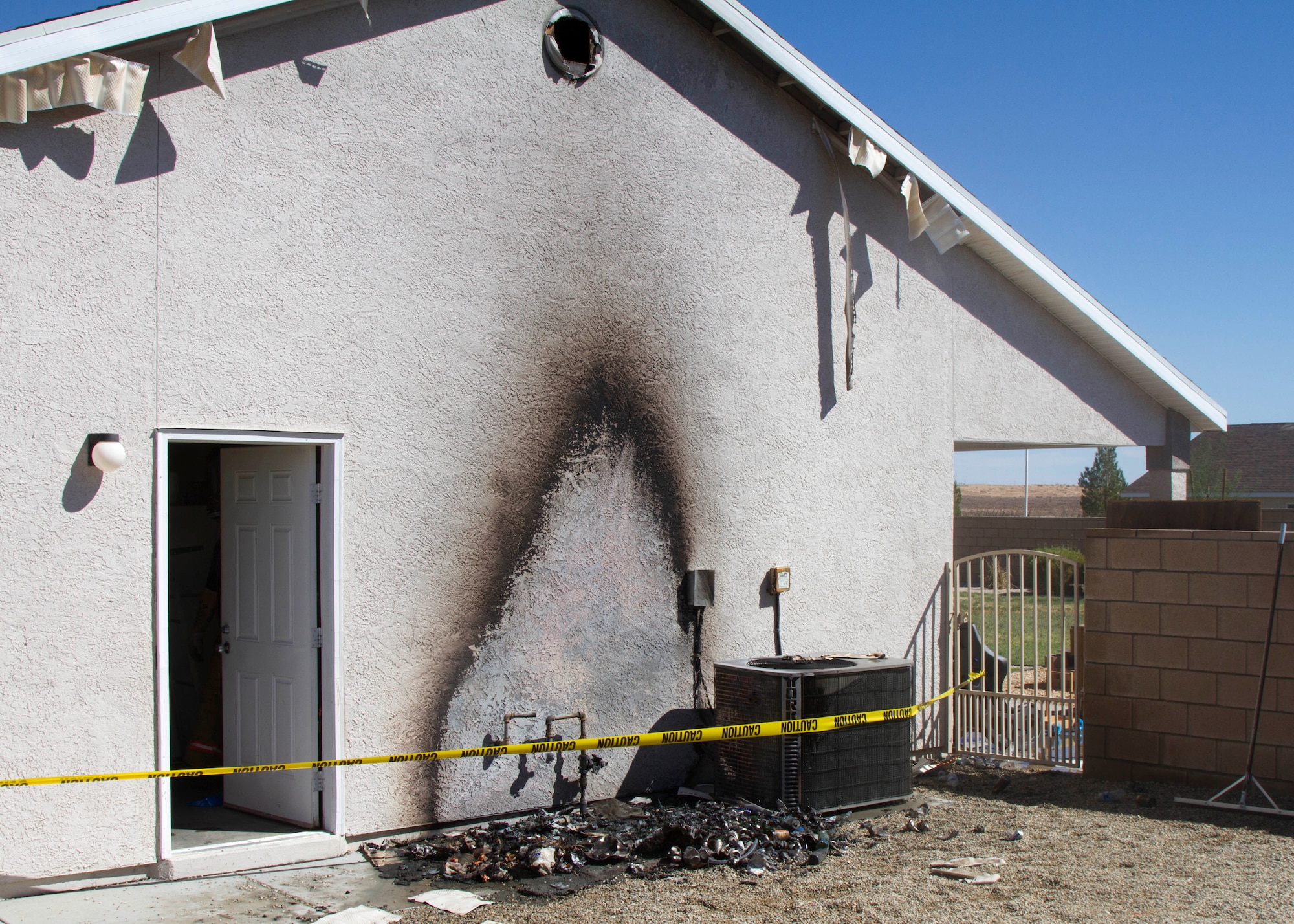 The aftermath of a resident fire in the Edwards AFB housing area last month. (U.S. Air Force photo by Brad White)