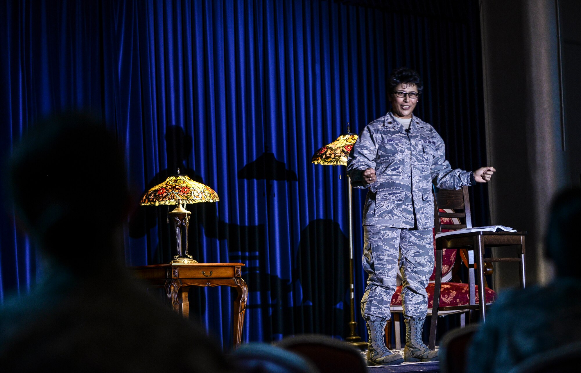 Maj. Eusebia Rios, 39th Air Base Wing deputy wing chaplain, tells her story to the audience during a Storytellers event at the Club Complex Nov. 8, 2014, Incirlik Air Base, Turkey. Rios talked about how the non-commissioned officers who were in her chain of command while being a young Airman, guided her be the leader she is today, and why NCOs are the core of our Air Force today. (U.S. Air Force photo by Airman Cory W. Bush/Released)