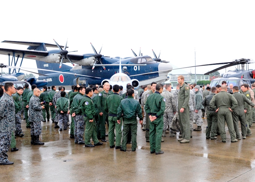 Japan Self-Defense Force and U.S. military personnel meet to talk about the capabilities of their aircraft during an aircraft static display on Komatsu Air Base, Japan, Nov. 09, 2014. This was done as part of exercise Keen Sword which is a joint-bilateral training exercise designed to increase the interoperability required to support the defense of Japan, respond to a potential crisis and offer humanitarian assistance. (U.S. Air Force photo by 2nd Lt. Erik Anthony/Released)