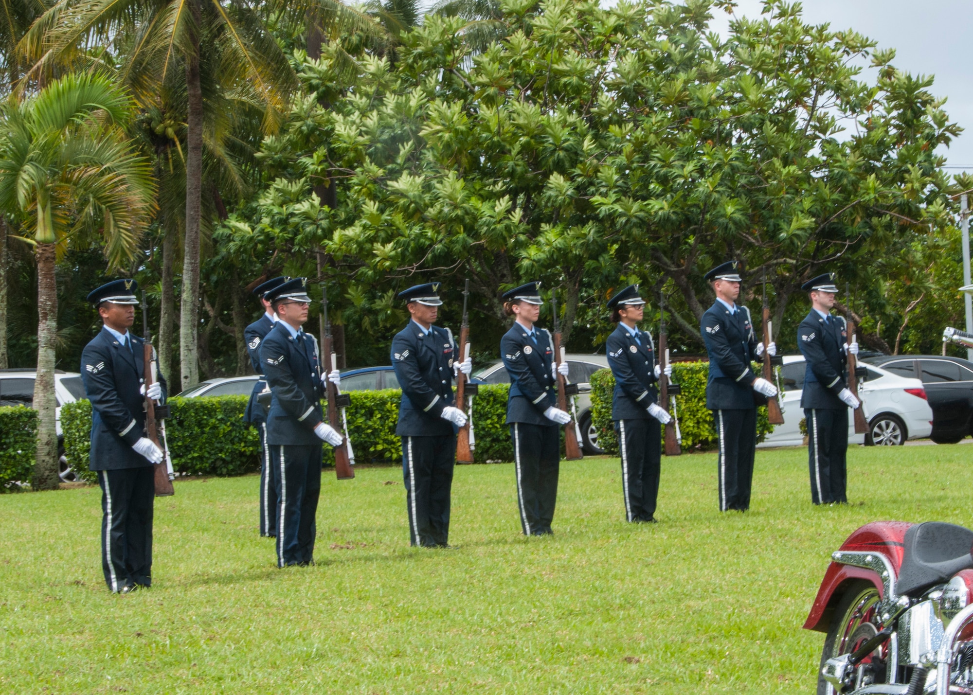 Members of the Andersen Air Force Base Blue Knights honor guard team prepare to give a 21-gun salute at the 2014 Guam Veterans Day ceremony at the Governors complex in Hagåtña, Guam Nov. 11, 2014. More than 200 people showed up to the ceremony to honor all military veterans including Staff Sgt. Maximilian Contreras, 36th Operation Support Squadron weather flight, who represented Andersen as the Air Force Veteran of the Year. (U.S. Navy photo by Leah Eclavea/Released)