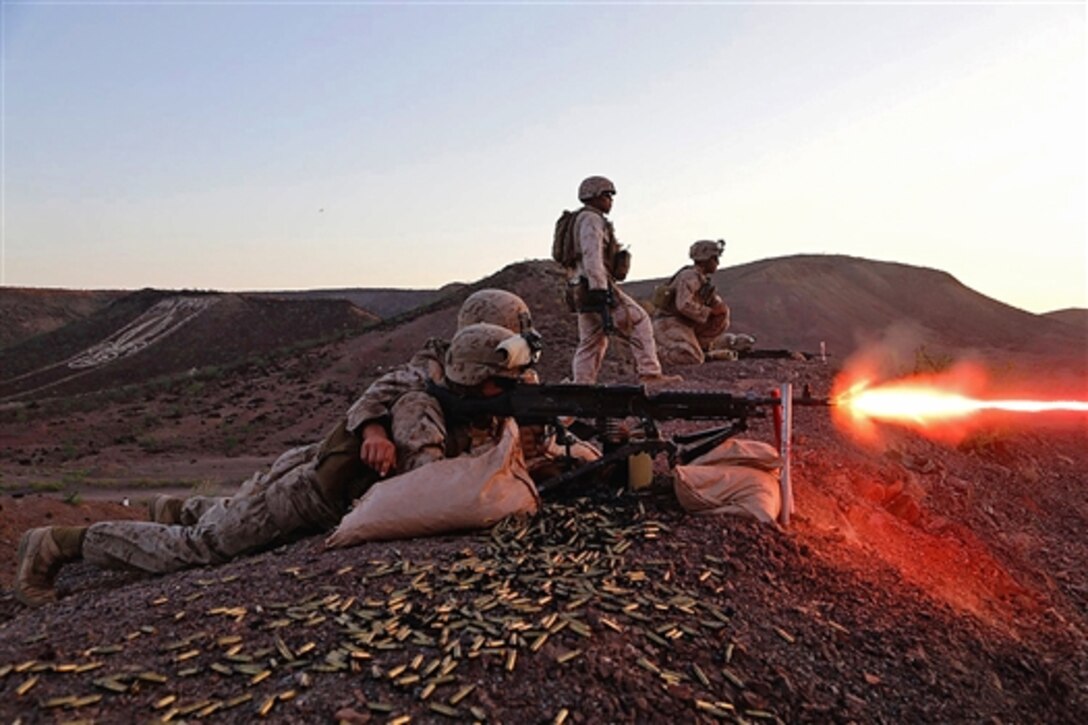 U.S. Marine machine gunners participate in an exercise at the Combat Training Center at Arta Beach, Djibouti, Nov. 3, 2014. The Marines are assigned to the 11th Marine Expeditionary Unit.  