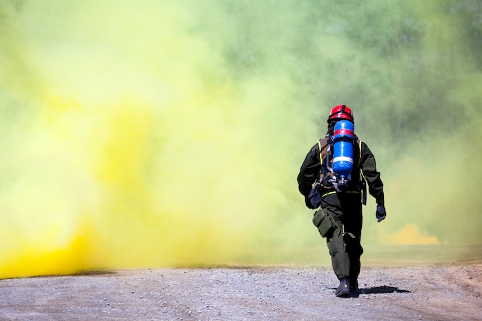 Marines and Sailors of the Chemical Biological Incident Response Force conduct a live chemical agent exercise at Fort A.P. Hill, Virginia on April 10. The unit conducted simulated casualty extraction in clouds of CS gas to prepare for real life evacuation situations. In order to execute its mission, CBIRF possesses a wide variety of unique skill sets that are task organized to address all possible aspects of a CBRNE attack. CBIRF has six major sections organic to the battalion: Explosive Ordnance Disposal, Technical Search and Rescue, Decontamination, Medical, Identification and Detection, and Search and Rescue/Casualty Extraction. (Official Marine Corps Photo by Sgt Kuande L. Hall/Released)


