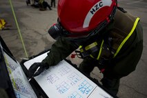 Marines and Sailors of the Chemical Biological Incident Response Force, II Marine Expeditionary Force participate in Exercise Scarlet Response at Guardian Centers in Perry, Ga., July 22. CBIRF personnel are trained to exercise command and control, agent detection and identification, search, rescue and decontamination, and emergency care for contaminated personnel.  During Scarlet Response, the Marines and Sailors are testing their ability to detect radiation, locate casualties, conduct vehicle extrication, and perform decontamination of simulated casualties  that have resulted from a mock nuclear explosion in a major U.S. city.   Exercise Scarlet Response is being executed as part of Exercise Vibrant Response 14, a combined Command Post Exercise / Field Training Exercise directed by Commander, U.S. Northern Command.(U.S. Marine Corps photo by Cpl. Ian M. Bush/Released)