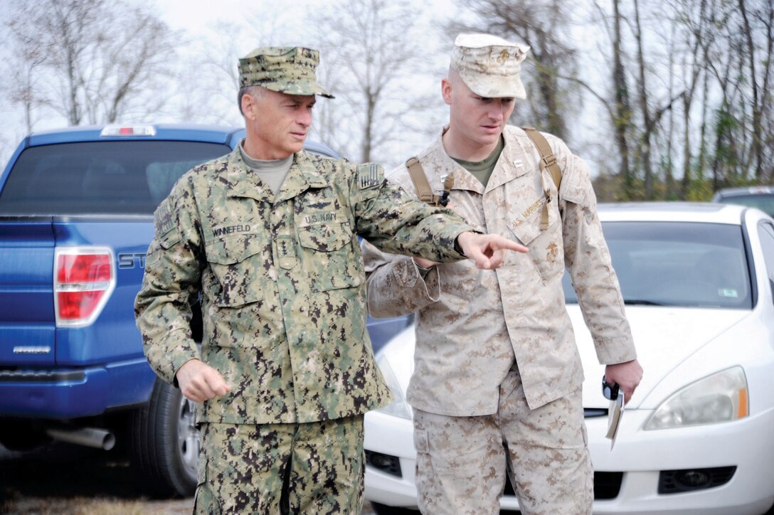 Capt. Charles Broun briefs Vice Chairman of the Joint Chiefs of Staff Adm. James Winnefeld Jr. before a live-fire mortar training session. 