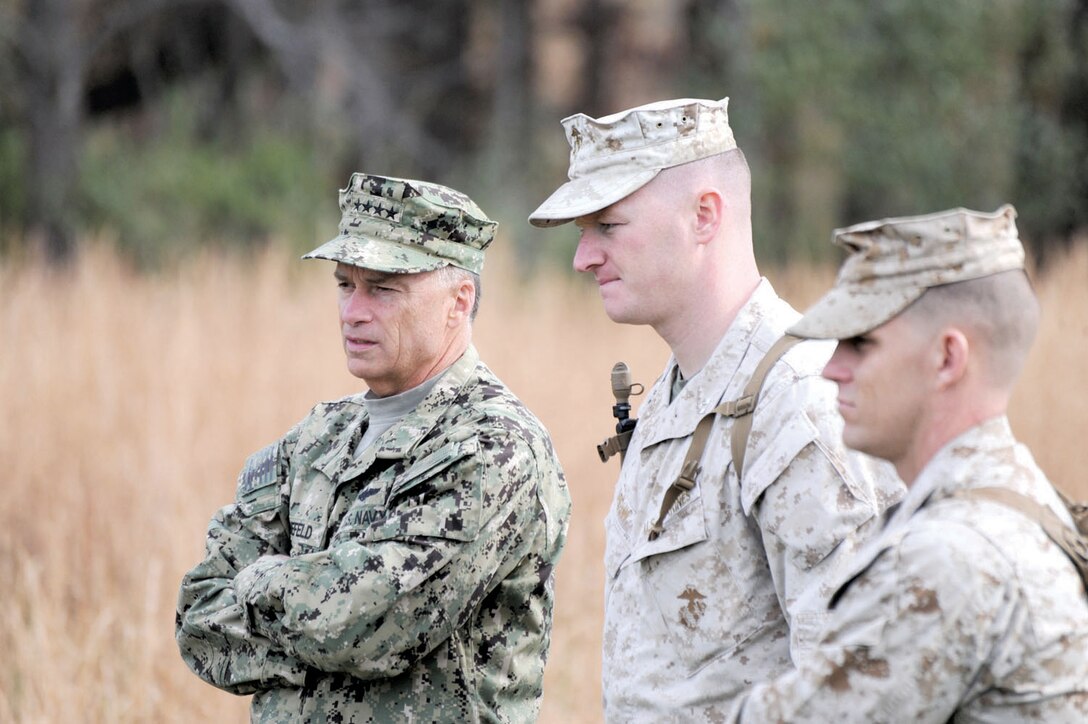 V ice Chairman of the Joint Chiefs of Staff Adm. James Winnefeld Jr., left, observes the preparation for a mortar live-fire event aboard Marine Corps Base Quantico with Capt. Charles Broun, deputy director of the Infantry Officer Course, and Maj. George Flynn, director of IOC. 