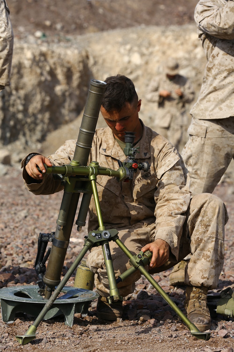 U.S. Marine Corps Lance Cpl. Patrick E. Martin, a mortarman with Fox Company, Battalion Landing Team 2nd Battalion, 1st Marines, 11th Marine Expeditionary Unit (MEU), and native of Mora, Minnesota, sights a 60mm mortar system as part of a patrol base exercise during sustainment training in D'Arta Plage, Djibouti, Nov. 11. The 11th MEU is a forward-deployed, flexible sea-based Marine Air-Ground Task Force in the U.S. 5th Fleet area of responsibility. (U.S. Marine Corps photo by Cpl. Jonathan R. Waldman/Released)