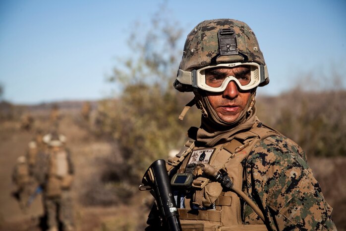 U.S. Marine Staff Sgt. Jorge Calderon patrols during a security element course aboard Camp Pendleton, Calif., Nov. 6 2014. Calderon is a platoon sergeant with Battalion Landing Team 3rd Battalion, 1st Marines, 15th Marine Expeditionary Unit. This three-week course is designed to improve the speed and accuracy of the Marines that will make up the maritime raid force’s security element when the 15th MEU deploys in the spring. (U.S. Marine Corps photo by Cpl. Elize Mckelvey/Released)