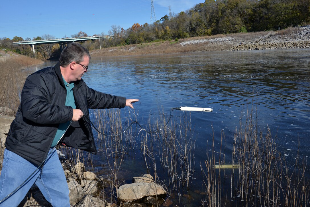 Mark Campbell, a hydrologist in the Water Management Section, Nashville District used two water quality multi-parameter signs into the tailwaters to collect, record water quality, check water temperatures, dissolved oxygen, conductivity and monitor pH levels at the J. Percy Priest Dam, Nov. 10, 2014.