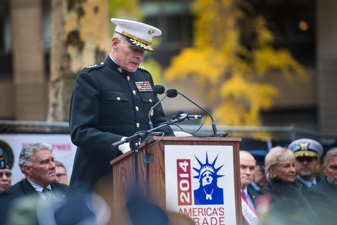 Guest of Honor Gen. John F. Kelly, Commander of U.S. Southern Command, speaks during the opening ceremony of New York City's annual Veterans Day Parade at Madison Square Park November 11, 2014. The parade, also known as America's Parade, highlights a different service each year. This year, the Marines were showcased for their legacy and traditions, which date back 239 years.