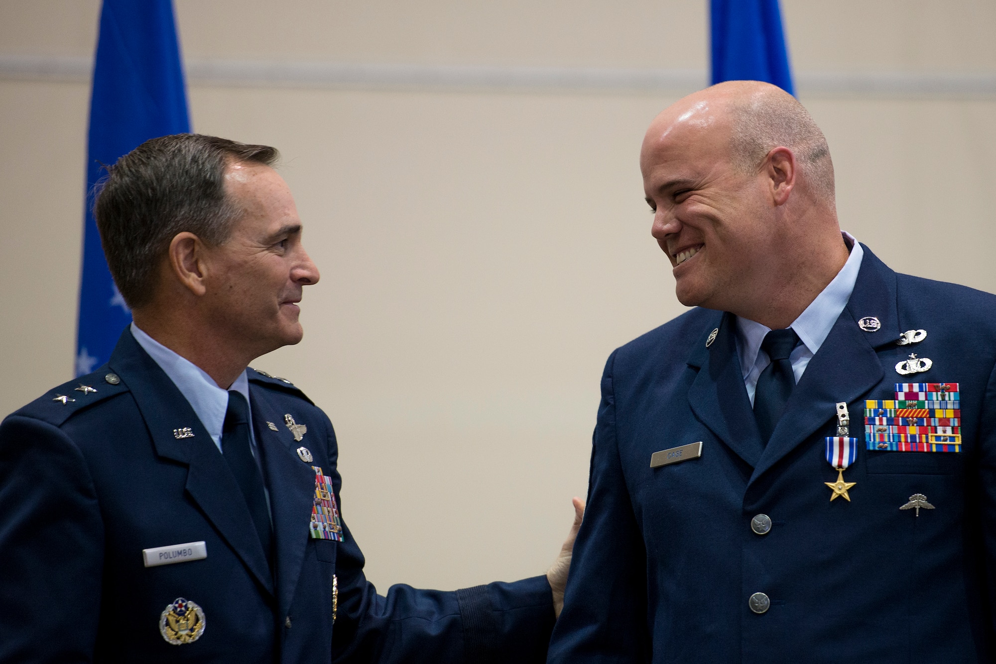 Maj. Gen. Harry Polumbo, Ninth Air Force Commander, presented Master Sgt. Thomas Case, Tactical Air Control Party Airman, 18th Air Support Operations Group, with his second Silver Star medal, Nov. 13, 2014 at Pope Army Airfield, N.C.  Case received the medal for gallantry in action during a 2009 deployment to Afghanistan. The Silver Star Medal is the U.S. military’s third highest military decoration for valor. It is presented for gallantry in action against an enemy of the U.S. (U.S. Air Force photo by Airman 1st Class Ryan Callaghan)