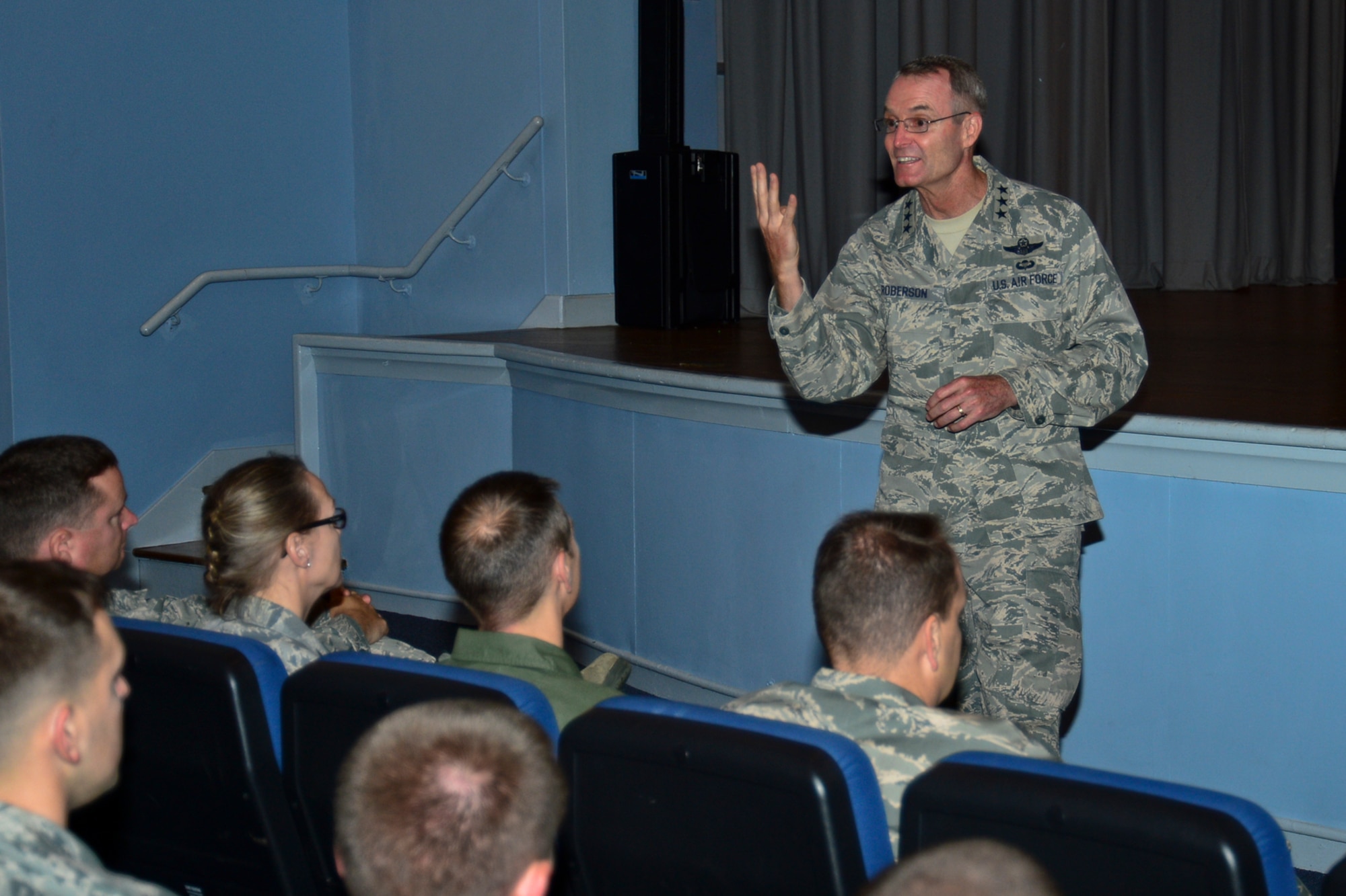 Lt. Gen. Darryl Roberson, 3rd Air Force and 17th Expeditionary Air Force commander, speaks with Liberty Wing Airmen at the all-call in the base theater at Royal Air Force Lakenheath, England, Nov. 13, 2014. Roberson concluded the all-call by expressing how impressed he was with the Airmen of RAF Lakenheath and challenged everyone to continue striving for excellence through innovation. (U.S. Air Force photo by Airman 1st Class Erin R. Babis/Released)