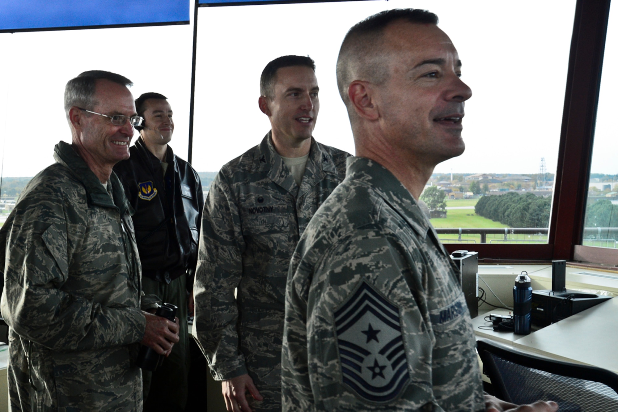 Lt. Gen. Darryl Roberson, 3rd Air Force and 17th Expeditionary Air Force commander, observes the flightline from the tower with Col. Robert Novotny, 48th Fighter Wing commander and Chief Master Sgt. Mark Marson, 3rd Air Force command chief master sergeant, at Royal Air Force Lakenheath, England, Nov. 13, 2014. During his visit, Roberson stressed the critical role the 48th Fighter Wing plays in NATO and in Europe. (U.S. Air Force photo by Airman 1st Class Erin R. Babis/Released)