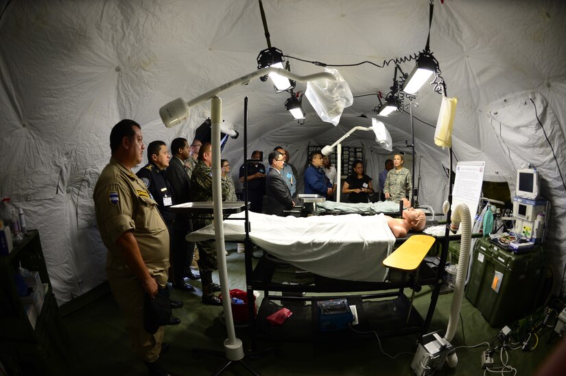 Members of JTF-Bravo’s Medical Element brief JTF-Bravo’s Honduran Leaders’ Day guests on the mobile surgical team capabilities at Soto Cano Air Base, Honduras, Nov. 14, 2014. Over 40 leaders from around the Republic of Honduras came to learn more about the mission and capabilities of JTF-Bravo and Soto Cano Air Base. (U.S. Air Force photo/Tech. Sgt. Heather Redman)