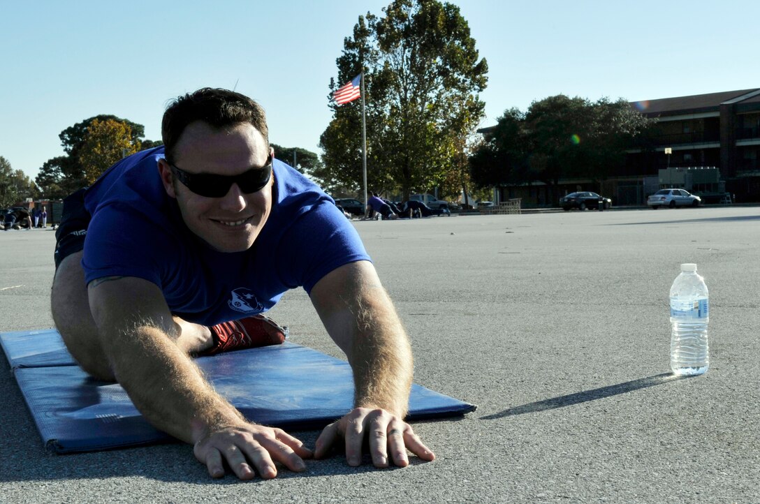 Staff Sgt. Mark McHan, Airey NCO Academy student, performs a work-out training exercise during the academy's physical training regimen Nov. 14 at Tyndall. The NCOA is designed to educate newly appointed noncommissioned officers and help develop their leadership skills. (U.S. Air Force photo by Airman 1st Class Ty-Rico Lea)