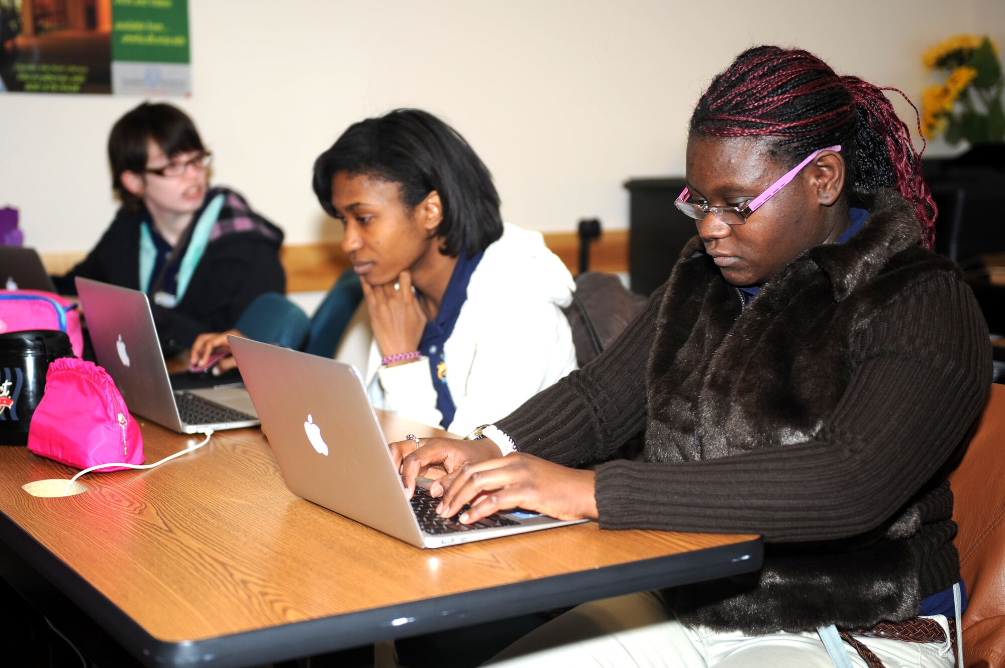 Project Search students practice their typing skills, Nov. 13, at McConnell Air Force Base, Kan. The program teaches students with disabilities basic job skills needed to be successful in the work place.  (U.S. Air Force photo/Airman 1st Class Tara Fadenrecht)