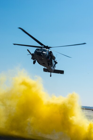 An HH-60G Pave Hawk hovers during the 2014 Flying Tiger Reunion Heritage Day combat search and rescue demonstration Nov. 14, 2014, at Moody Air Force Base, Ga. The multi-unit exhibition highlighted the capabilities of the 23d Wing’s HH-60G Pave Hawk, A-10C Thunderbolt II and HC-130J Combat King II. (U.S. Air Force photo by Airman 1st Class Ceaira Tinsley/Released)