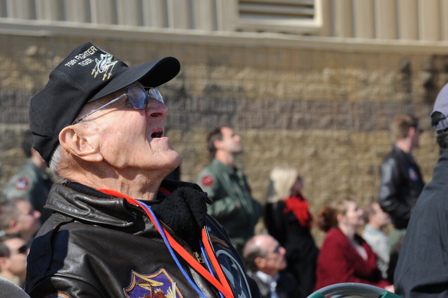 Don Miller, former 75th Fighter Squadron pilot and World War II veteran, watches a Combat Search and Rescue demonstration at Moody Air Force Base, Ga., Nov. 14, 2014.  The demo was held during the 2014 Flying Tiger Reunion heritage day.  (U.S. Air Force photo by Andrea Jenkins/Released)