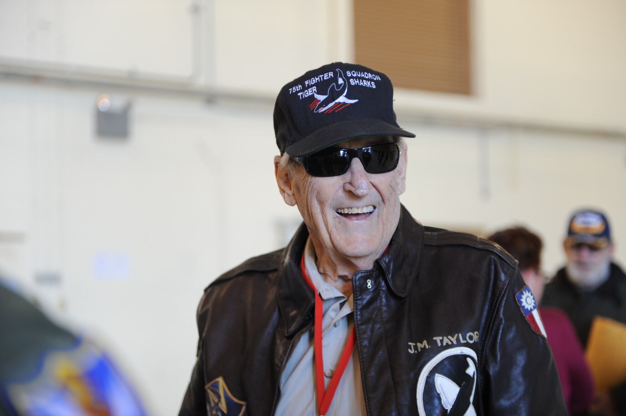 J.M. Taylor, a former 75th Fighter Squadron pilot and World War II veteran, is all smiles during the 2014 Flying Tiger Reunion heritage day, Nov. 14, 2014, at Moody Air Force Base, Ga.  Taylor was a prisoner of war for 10 months during World War II.  (U.S. Air Force photo by Andrea Jenkins/Released)