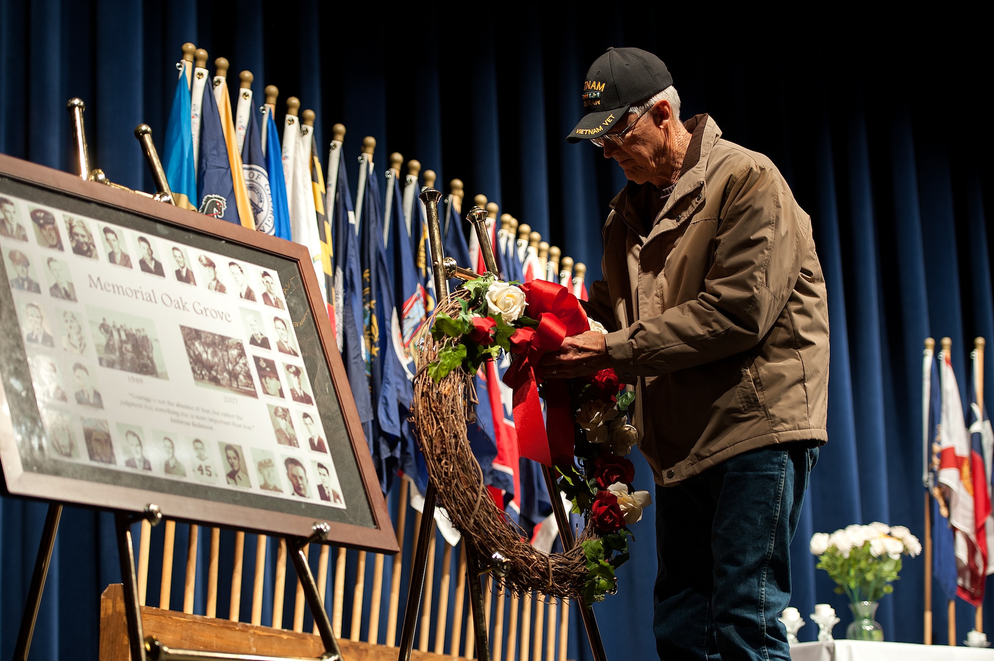 SAN ANGELO, Texas – James Shook, Vietnam Veteran, lays a wreath during the Candlelight Vigil Ceremony at Angelo State University Nov. 12. He laid the wreath in honor of the 100th anniversary of World War I. (U.S. Air Force photo/ Airman 1st Class Devin Boyer)