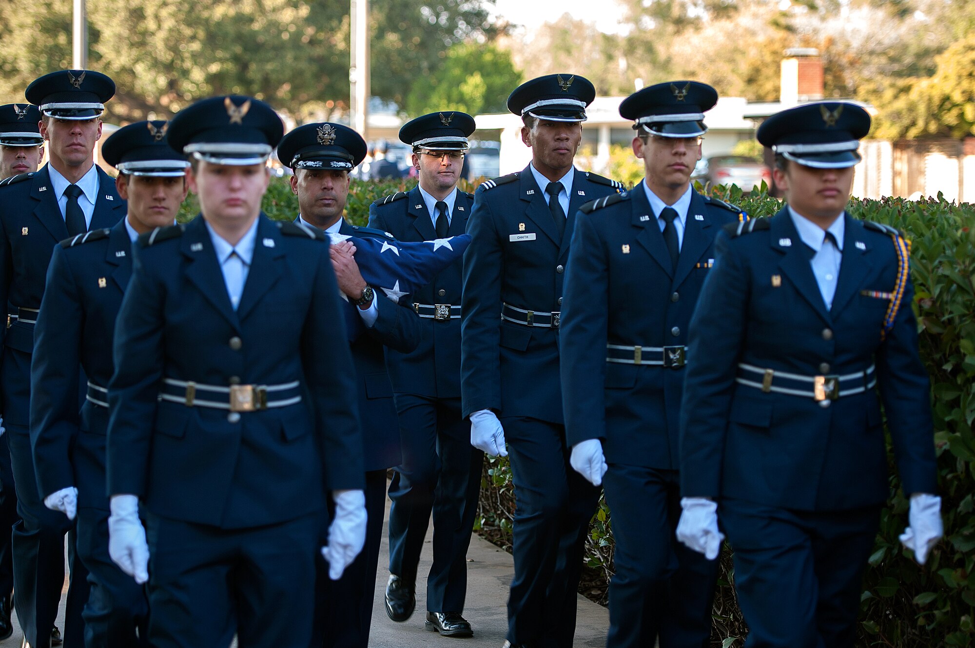 SAN ANGELO, Texas – Lt. Col. Pedro E. Matos, Angelo State University Air Force ROTC Detachment 847 Commander, retires the American Flag with ASU Air Force ROTC cadets during the 2014 Air Force ROTC Flag Retreat at ASU Nov. 12. The flag retreat coincided with a candlelight vigil ceremony honoring service members who paid the ultimate sacrifice. (U.S. Air Force photo/ Airman 1st Class Devin Boyer)