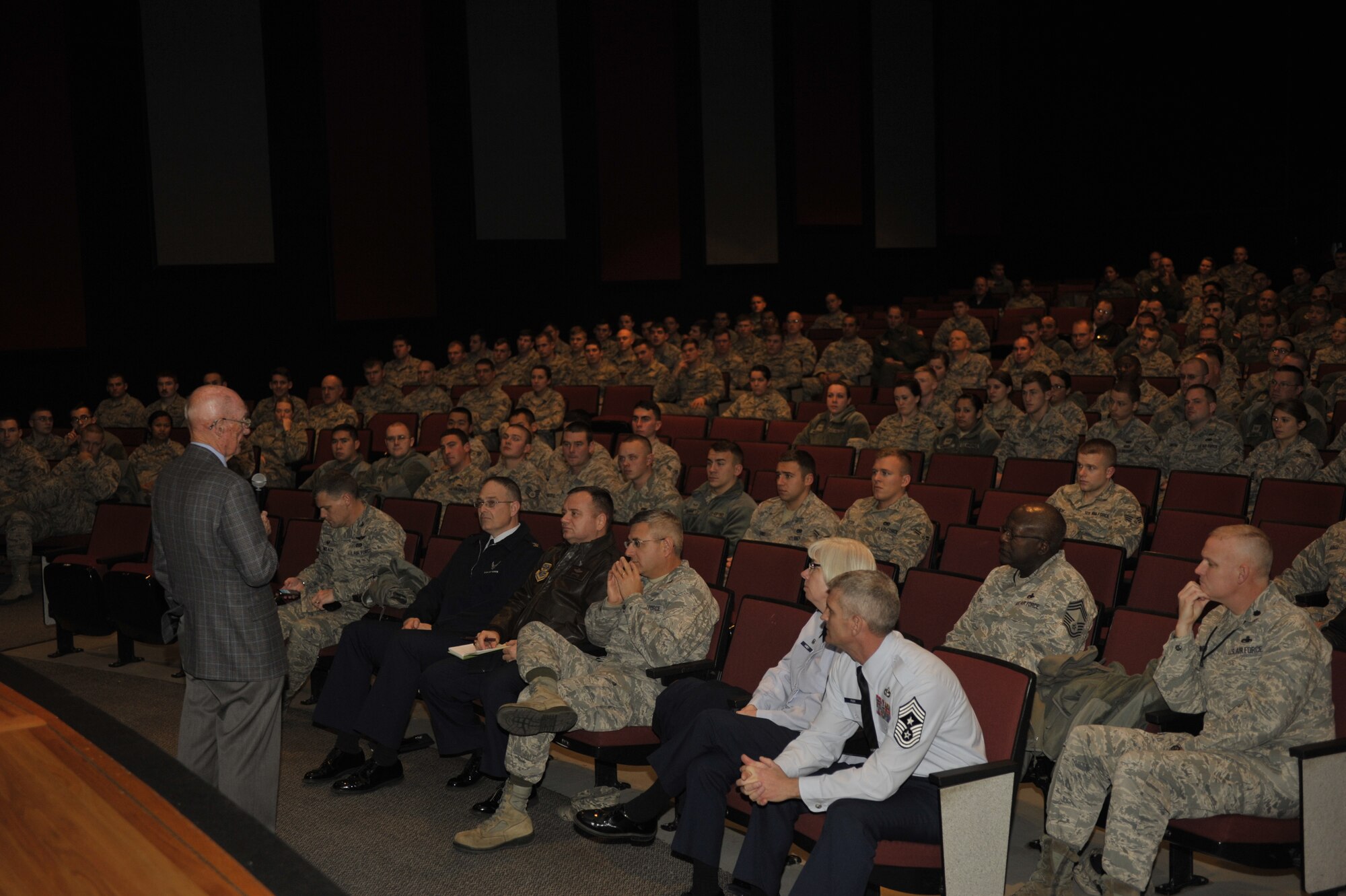 Retired Chief Master Sgt. of the Air Force James McCoy speaks to Airmen Nov. 12, 2014, on Fairchild Air Force Base, Wash. McCoy, who was the sixth chief master sgt. of the Air Force, participated in a Veterans Day event in Spokane Wash., and toured the base. At the end of the tour, he held an all call to talk with Airmen about his career and provide advice on being successful in the Air Force. (U.S. Air Force photo/Airman 1st Class Taylor Bourgeous)