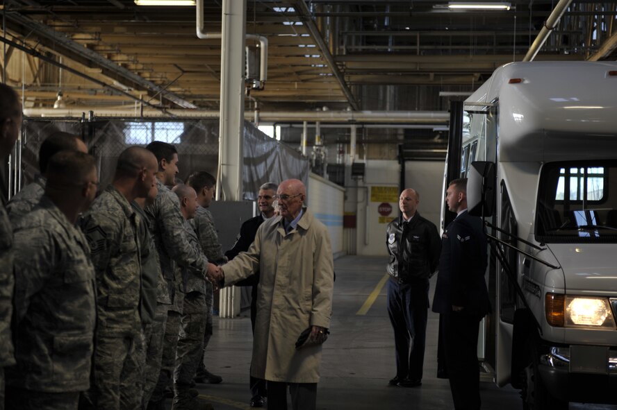 Retired Chief Master Sgt. of the Air Force James McCoy greets members of the 92nd and 141st Maintenance Group, inside a hangar Nov. 12, 2014, on Fairchild Air Force Base, Wash. McCoy, who was the sixth chief master sgt. of the Air Force, participated in a Veterans Day engagement in Spokane Wash., and toured the base. (U.S. Air Force photo/Airman 1st Class Taylor Bourgeous)