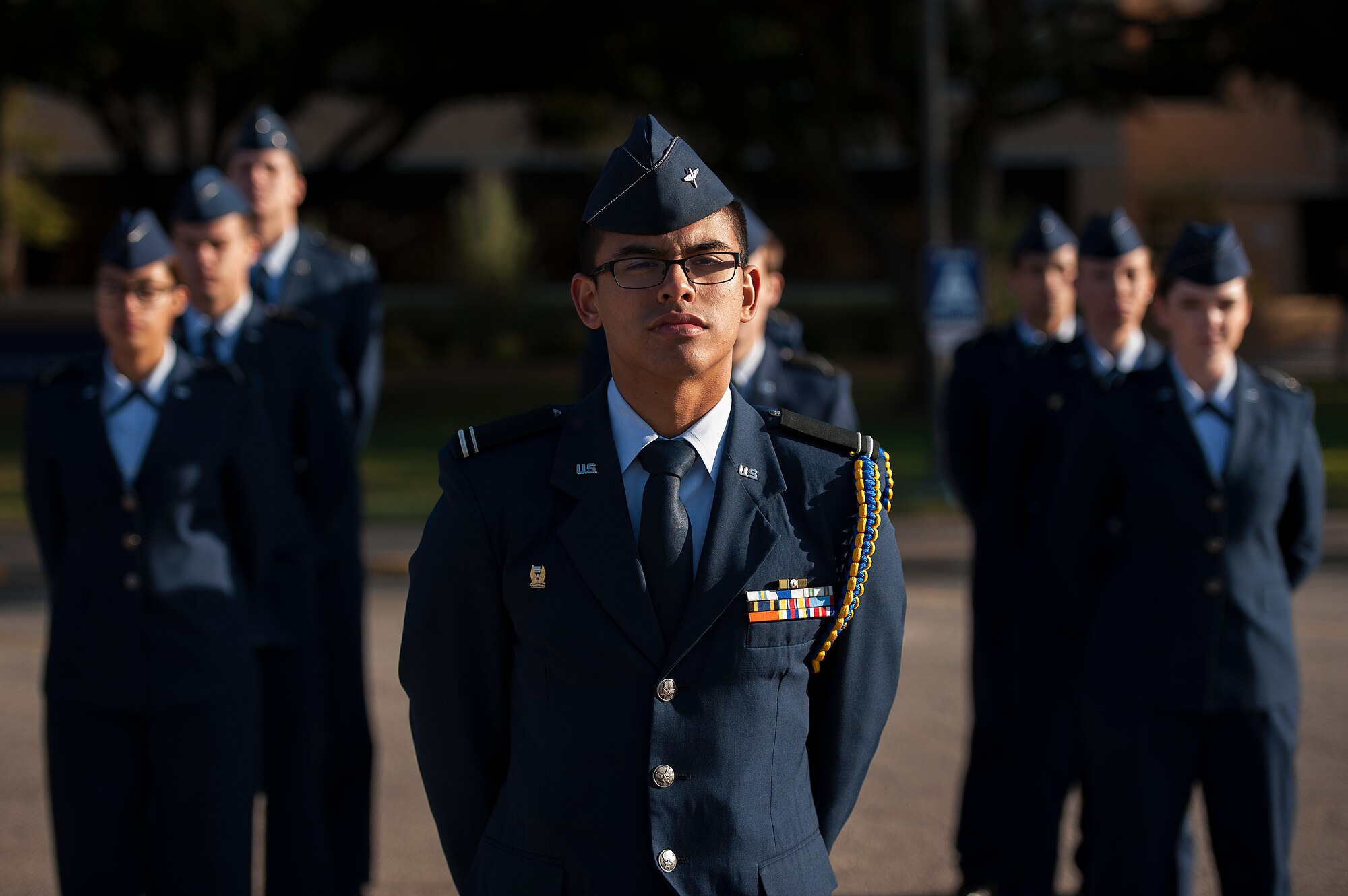 SAN ANGELO, Texas – Ruben Perez Jr., Angelo State University Air Force ROTC cadet, stands at parade rest with his flight during the 2014 Air Force ROTC Flag Retreat at ASU Nov. 12. Air Force ROTC is a college program offered at more than 1,100 campuses across the country preparing young men and women to become leaders in the Air Force. (U.S. Air Force photo/ Airman 1st Class Devin Boyer)