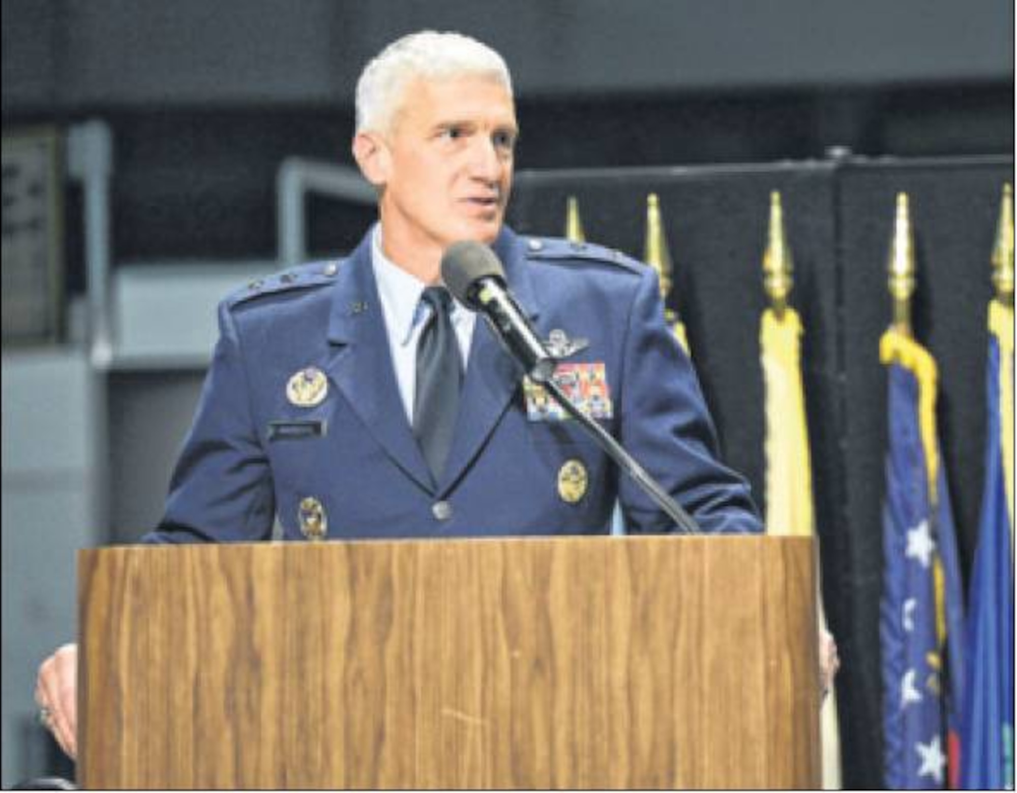 Maj. Gen. Tom Masiello welcomes attendees to the 2014 Air Force Research Laboratory Fellows and Early Career Awards Banquet on Oct. 30 at the National Museum of the U.S. Air Force. The annual event recognizes AFRL’s best and brightest scientists and engineers. Masiello is AFRL commander. (Air Force photo by Wesley Farnsworth)