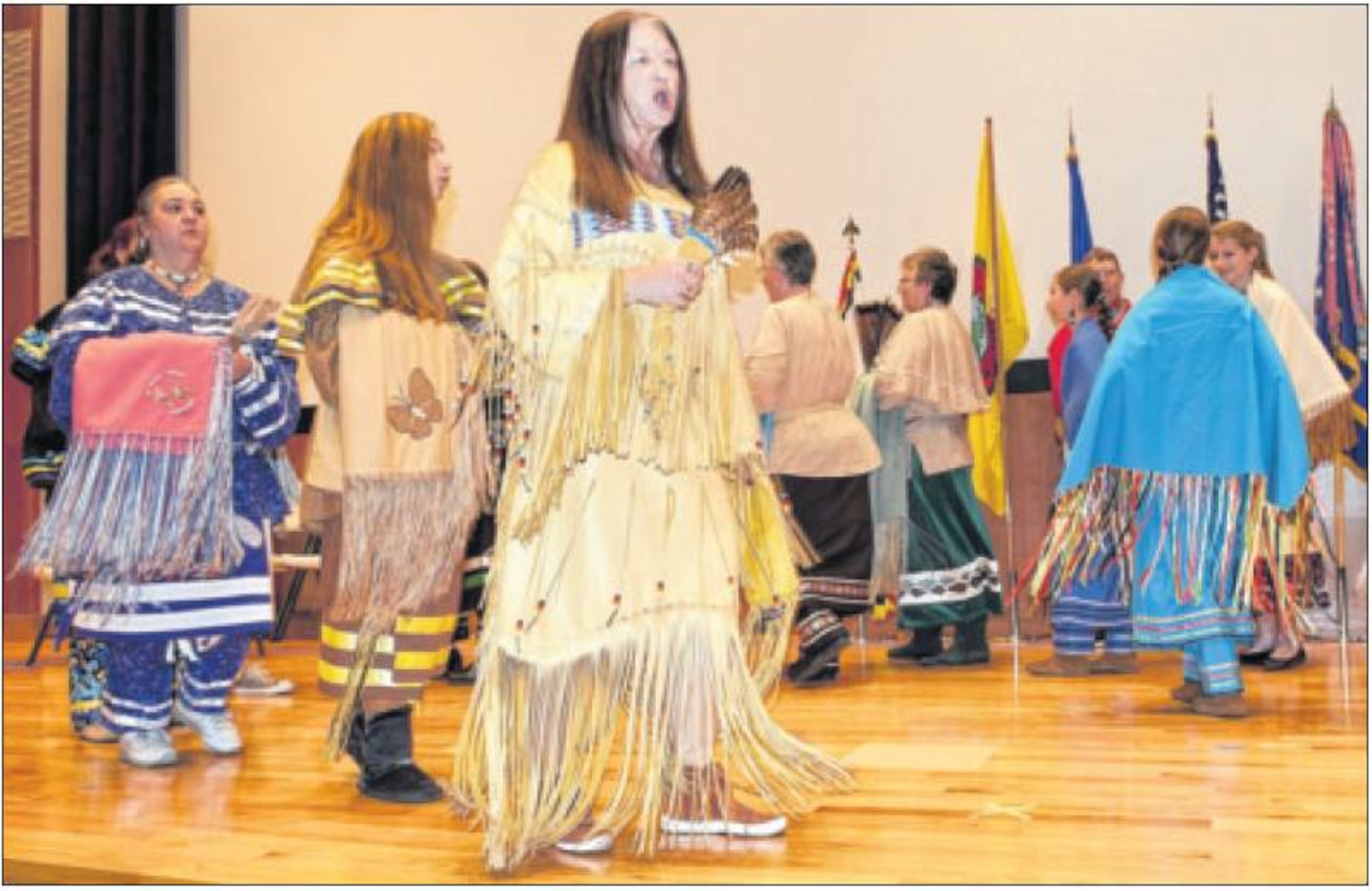 Members of the Miami Nation of Indians of Indiana demonstrate a traditional Native American blanket dance during a performance at the National Air and Space Intelligence Center on Nov. 7. The hour-long performance was held in recognition of National American Indian Heritage Month. (Air Force photos by Staff Sgt. Eunique Thomas)