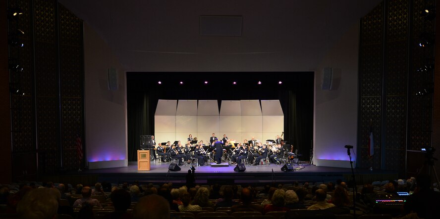 The Air Force Band of the West performs Nov. 9, 2014, at Hardin-Simmons University in Abilene, Texas. The band is responsible for seven states within a 580,000 square-mile region. The 61-member squadron executes more than 300 music productions each year. (U.S. Air Force photo by Senior Airman Peter Thompson/Released)