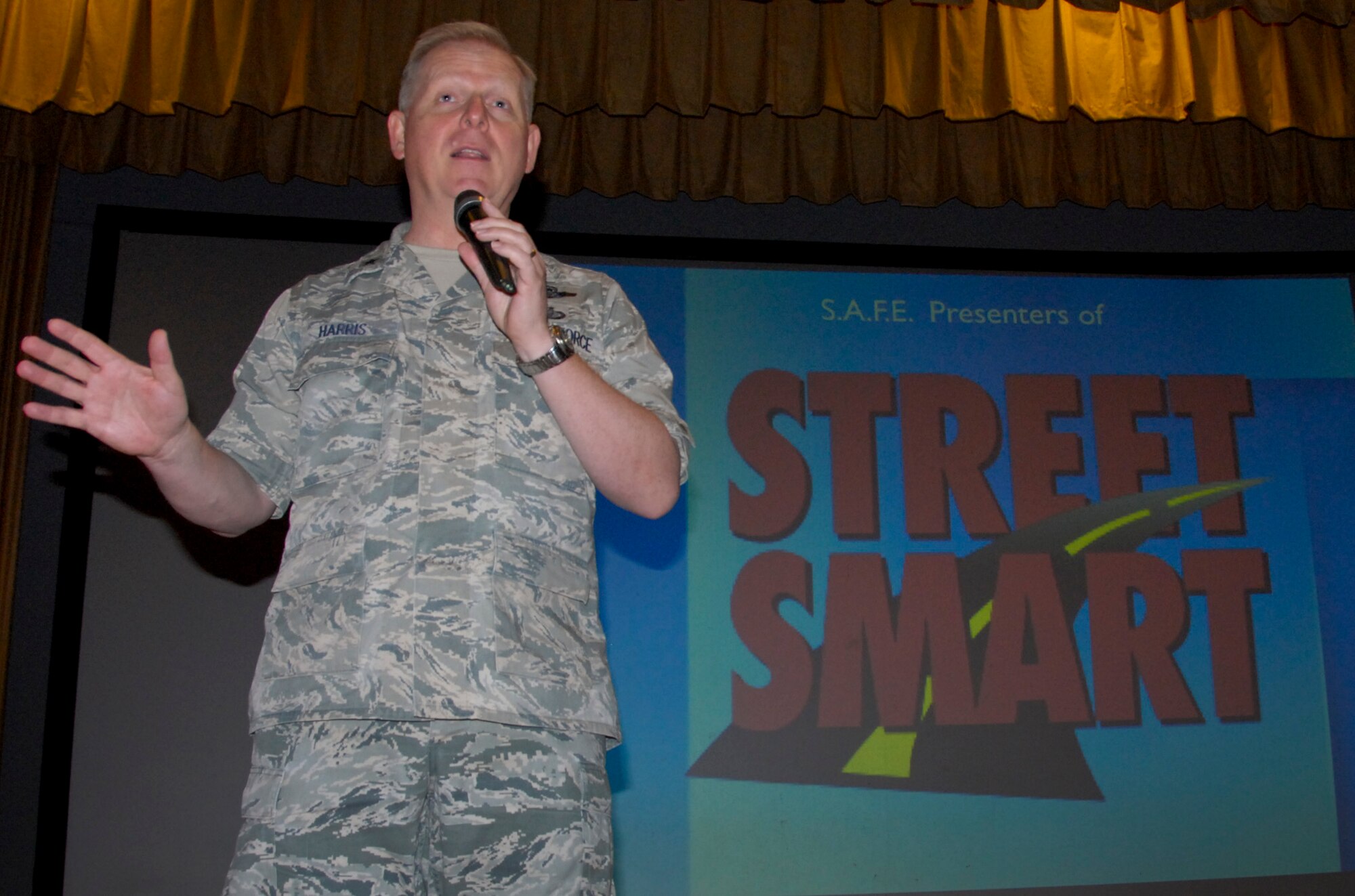 Brig. Gen. David Harris, 96th Test Wing commander, asks Airmen and civilians to be safe and make smart decisions during the “Street Smart” program at the Holiday Traffic Safety Campaign Nov. 13.  (U.S. Air Force photo/Kevin Gaddie)